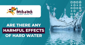 Graphic with splash of water and text: "Are there any harmful effects of hard water?" Includes Fetch-a-Tech logo with plumbing, heating, and air services.
